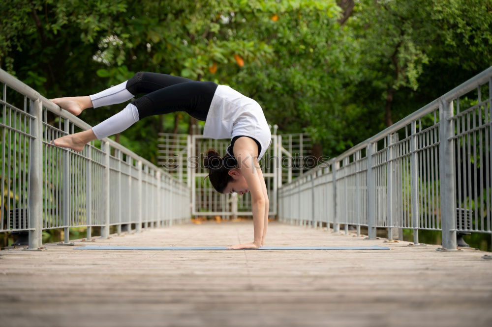 Similar – Man doing yoga in nature.