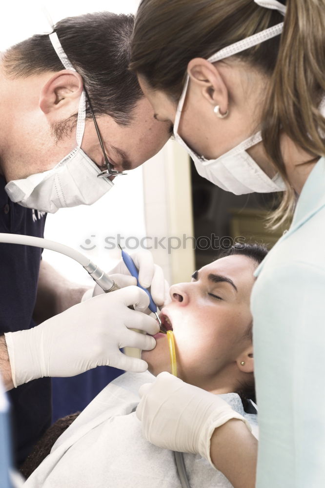 Similar – Image, Stock Photo A fragment of a dental room with a kid, lying on a dental chair, and a part of his doctors figure