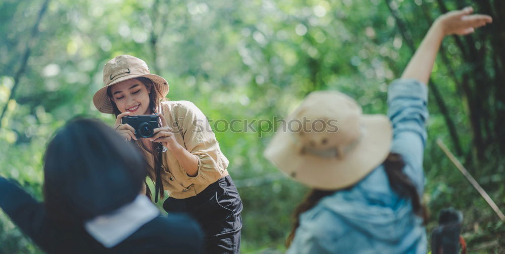 Similar – Image, Stock Photo Couple doing trekking looking with binoculars
