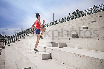 Similar – Two sportsmen running up stairs