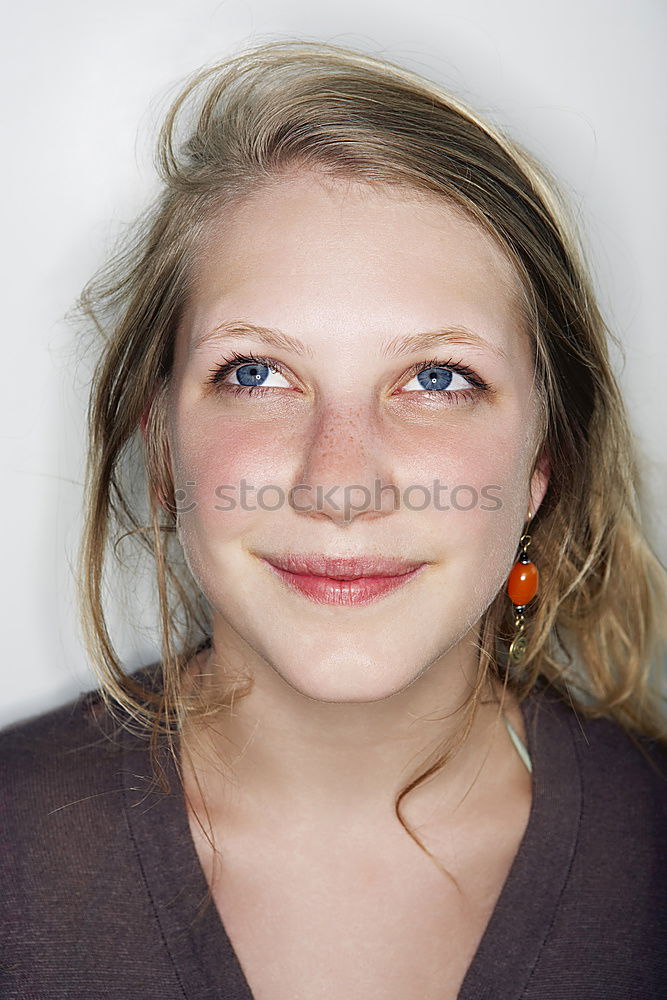 Similar – Image, Stock Photo young woman with freckles smiles cheeky on analogue picture