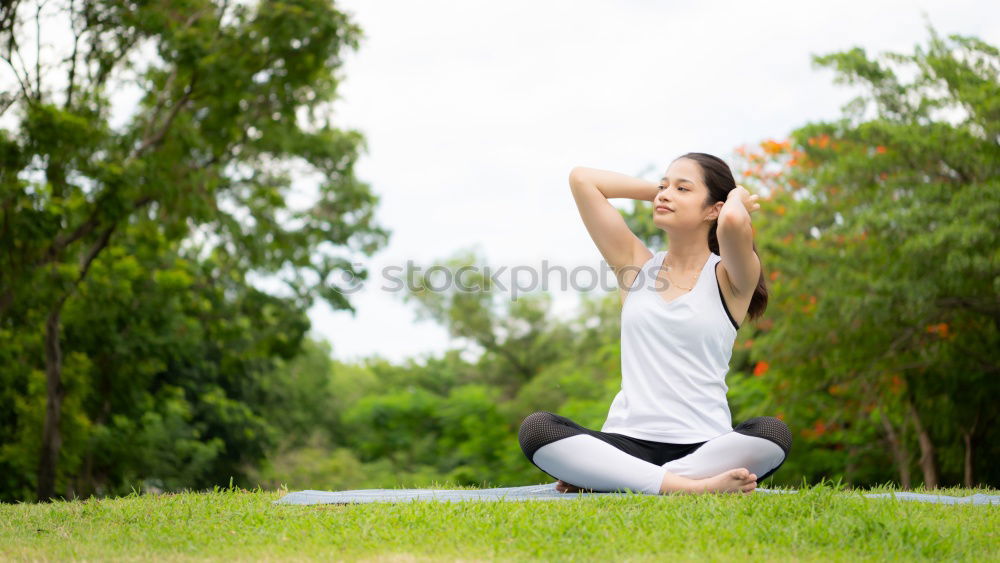 Similar – Image, Stock Photo Young Arab woman doing yoga in nature.