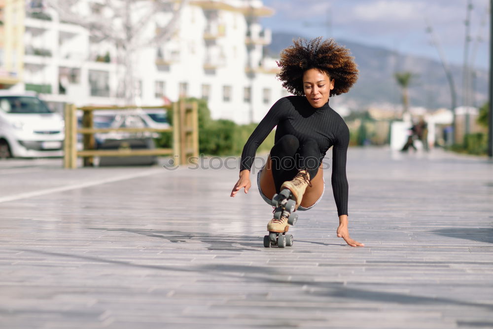 Similar – Image, Stock Photo Woman with earphones lacing shoes on street