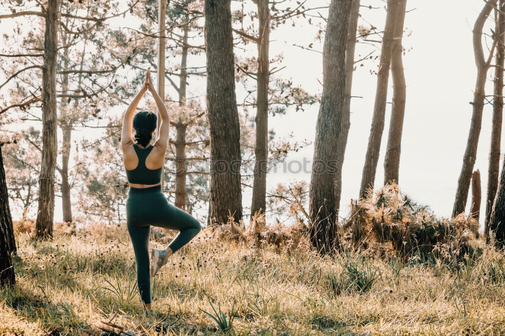 Similar – young woman doing yoga exercise outdoor