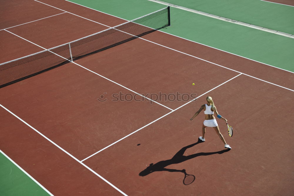 Similar – Tennis ball just over the net after powerful first serve of a player