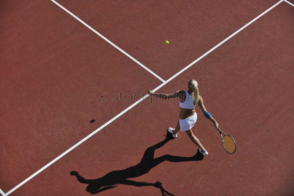 Similar – Tennis ball just over the net after powerful first serve of a player