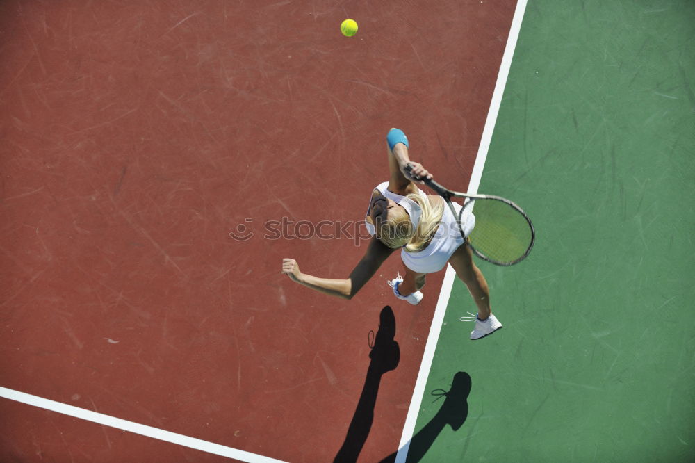 Similar – Tennis ball just over the net after powerful first serve of a player