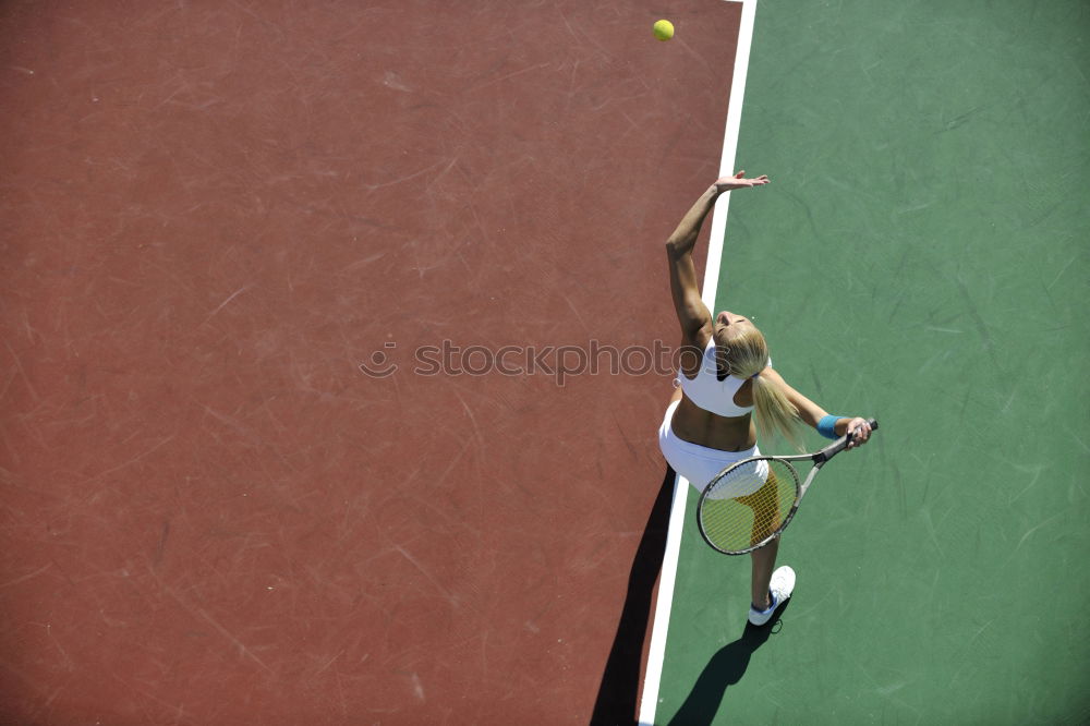 Similar – Tennis ball just over the net after powerful first serve of a player