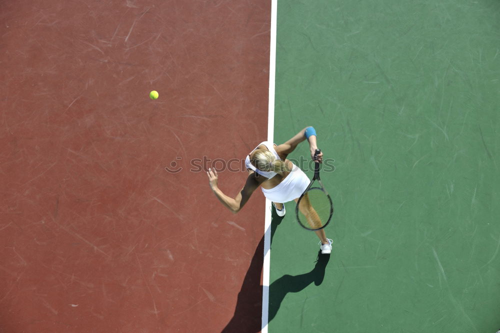 Similar – Tennis ball just over the net after powerful first serve of a player