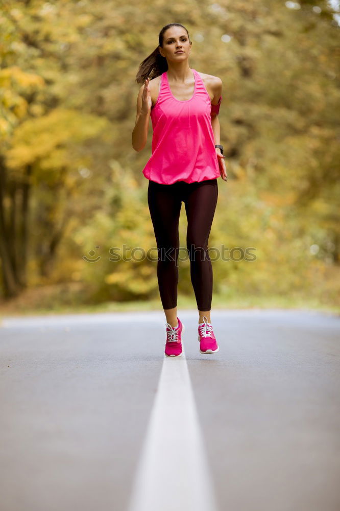 Similar – Athletic Woman in Running Exercise at the Park