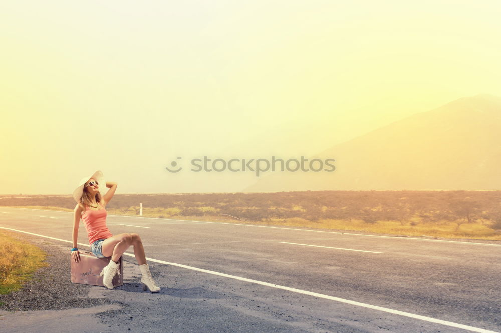 Similar – Father and son running on the road at the day time. Concept of tourism.