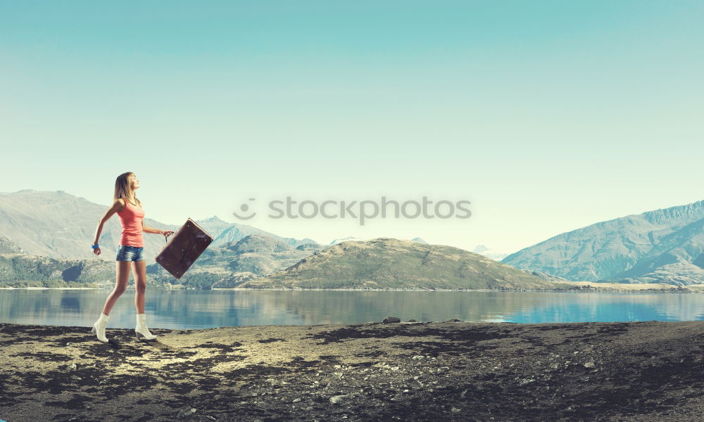 Similar – Image, Stock Photo Couple walking on lake shore