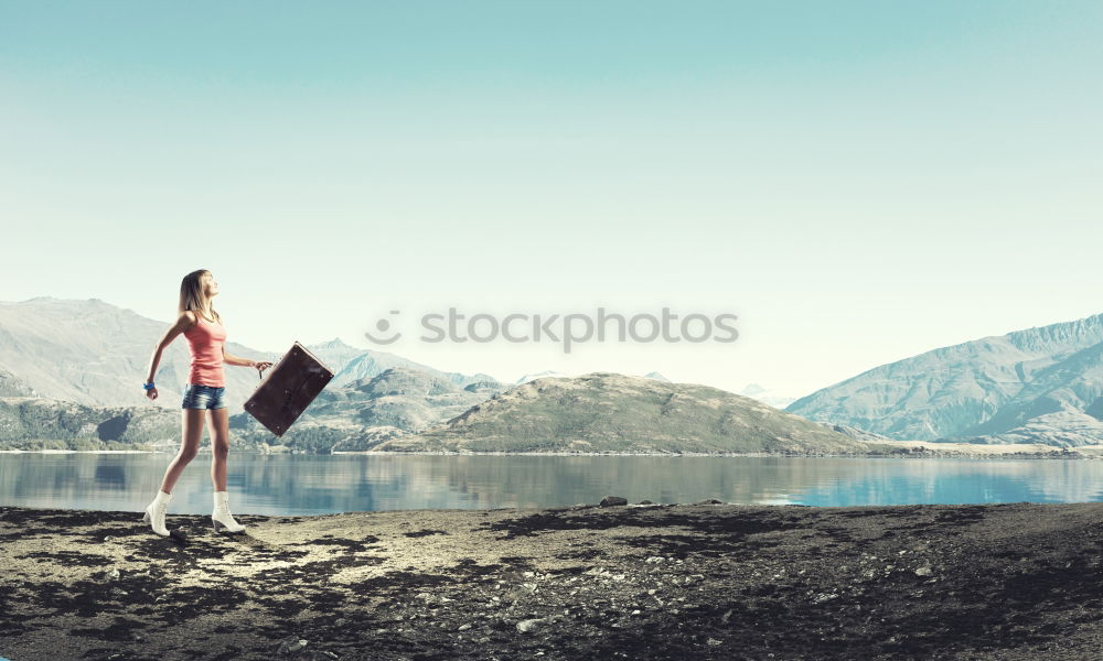 Similar – Image, Stock Photo Couple walking on lake shore