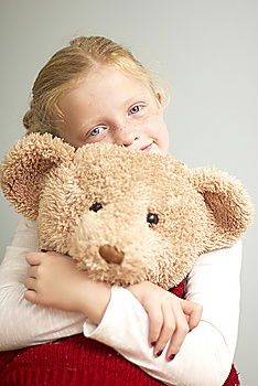 Similar – Young girl cuddles stuffy