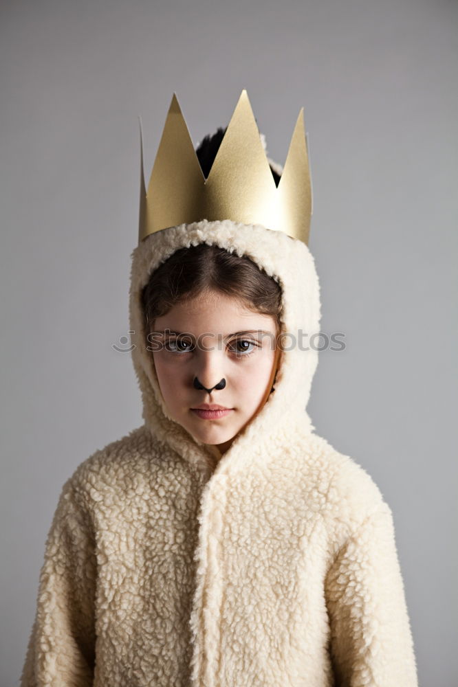 Similar – Child dressed and made up as a lion at carnival