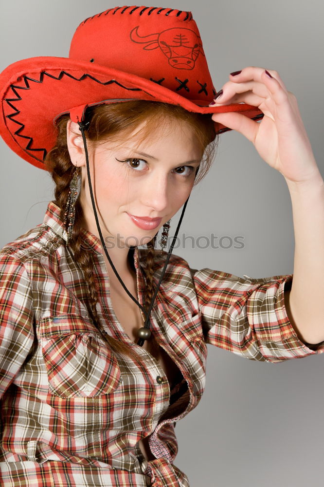 Similar – Image, Stock Photo Beautiful girl disguised of witch decorating a pumpkin at home.