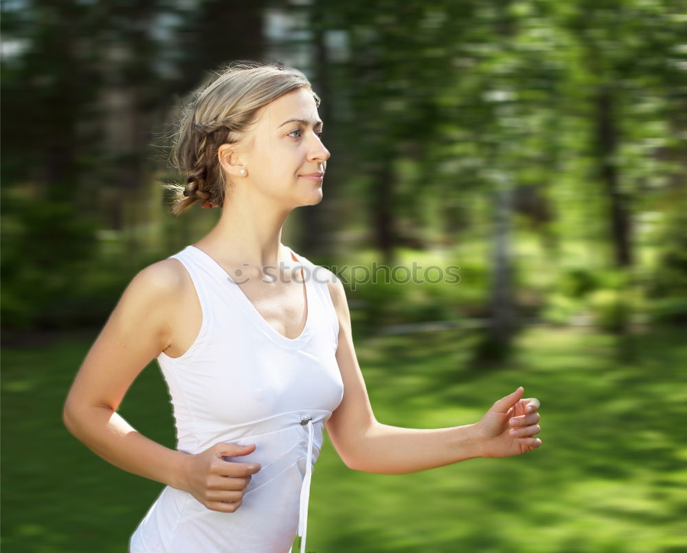 Similar – Attractive woman out exercising in glowing light