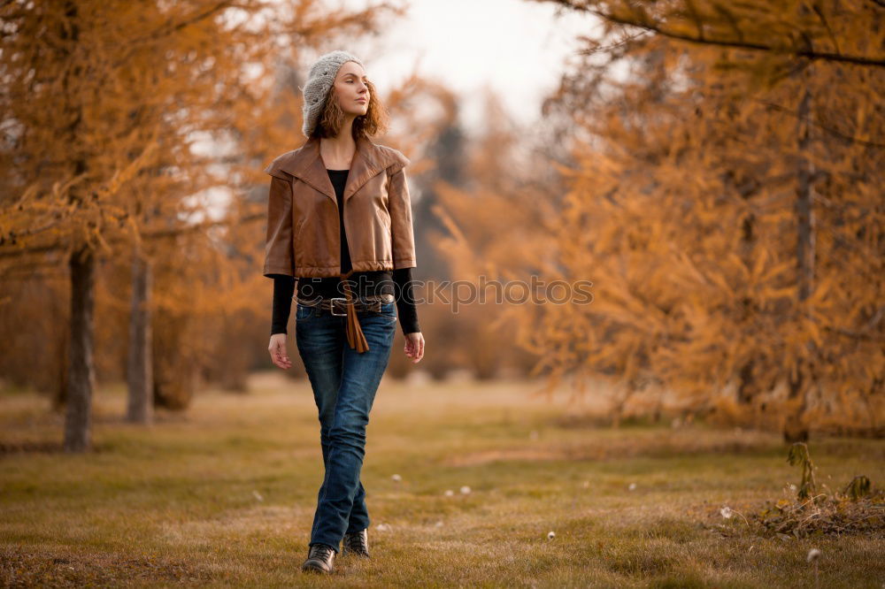 Similar – young pregnant woman walking in autumn