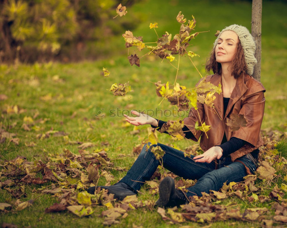 Similar – Senior citizen looks up in autumn forest