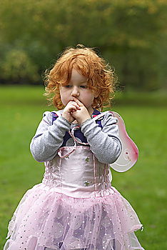 Similar – Image, Stock Photo Little playful, dreamy, pretty, beautiful, sweet, dressed up princess in pink, pink dress with tulle, stands at carnival, carnival as a spectator, visitors at the carnival procession in the street, on confetti and looks, watches, enjoys the party.