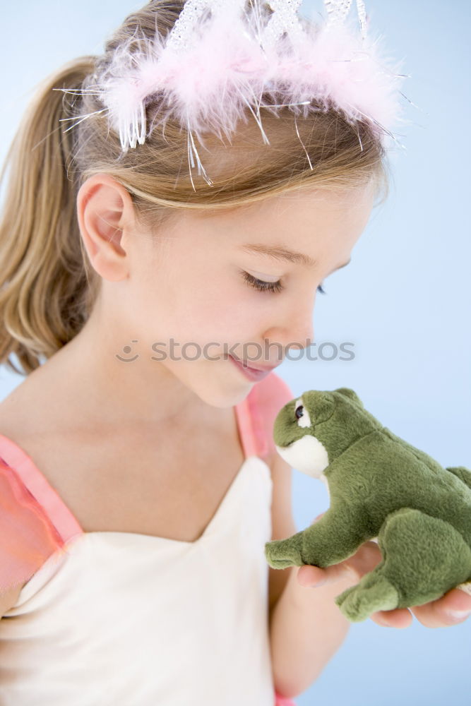 Similar – Young girl cuddles stuffy