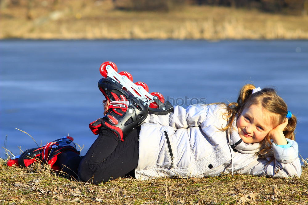 Similar – Image, Stock Photo blonde woman sitting in the grass and stretching in a park