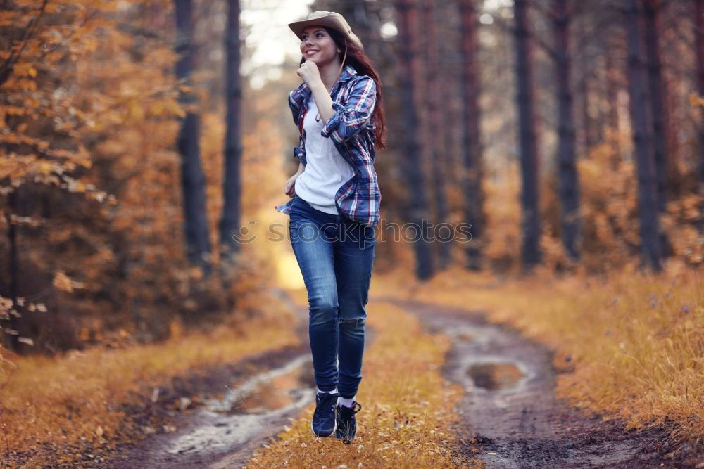 Similar – Image, Stock Photo Joyful young woman throwing autumn leaves