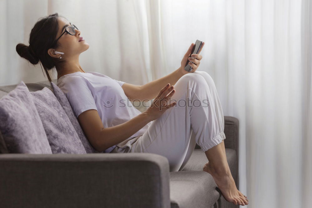 Similar – woman on bed enjoying a cup of coffee. morning