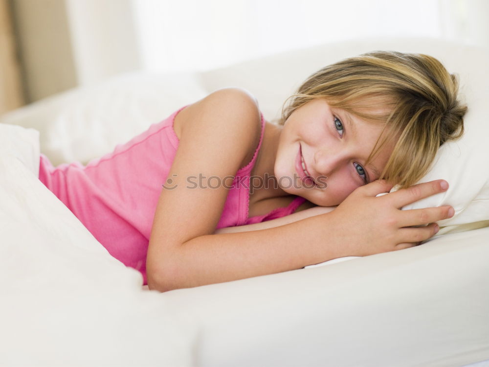 Similar – cute happy toddler girl on bed