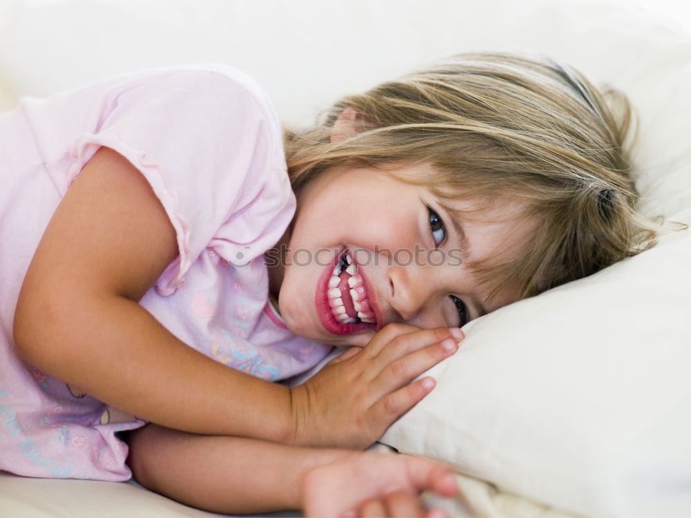 Similar – cute happy toddler girl on bed