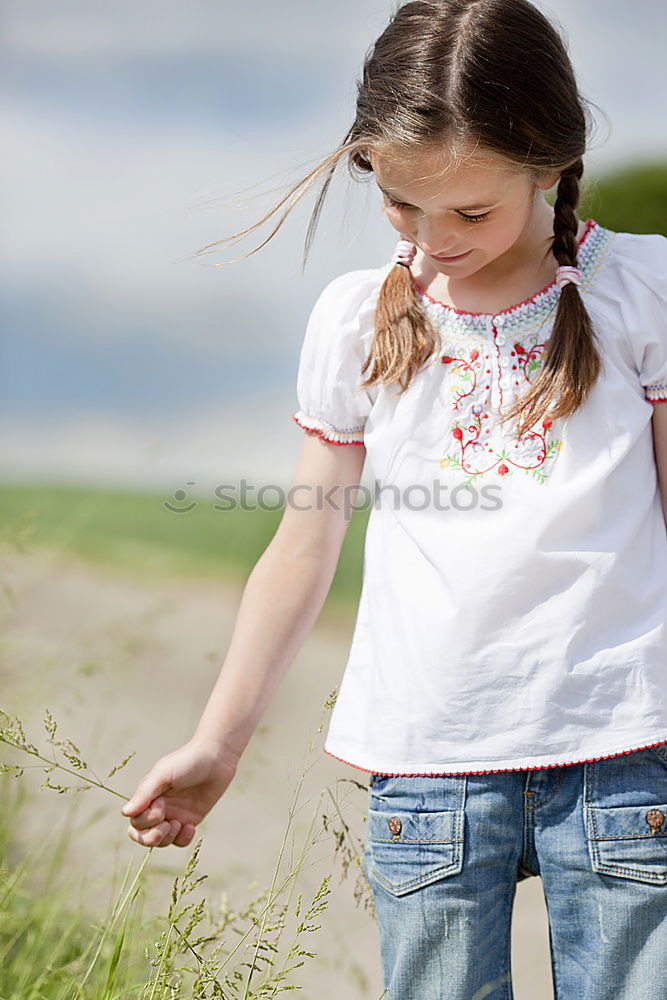 Similar – Image, Stock Photo Little girl discovering nature