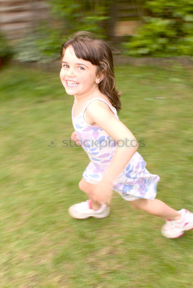 Similar – Girl climbs on boulder