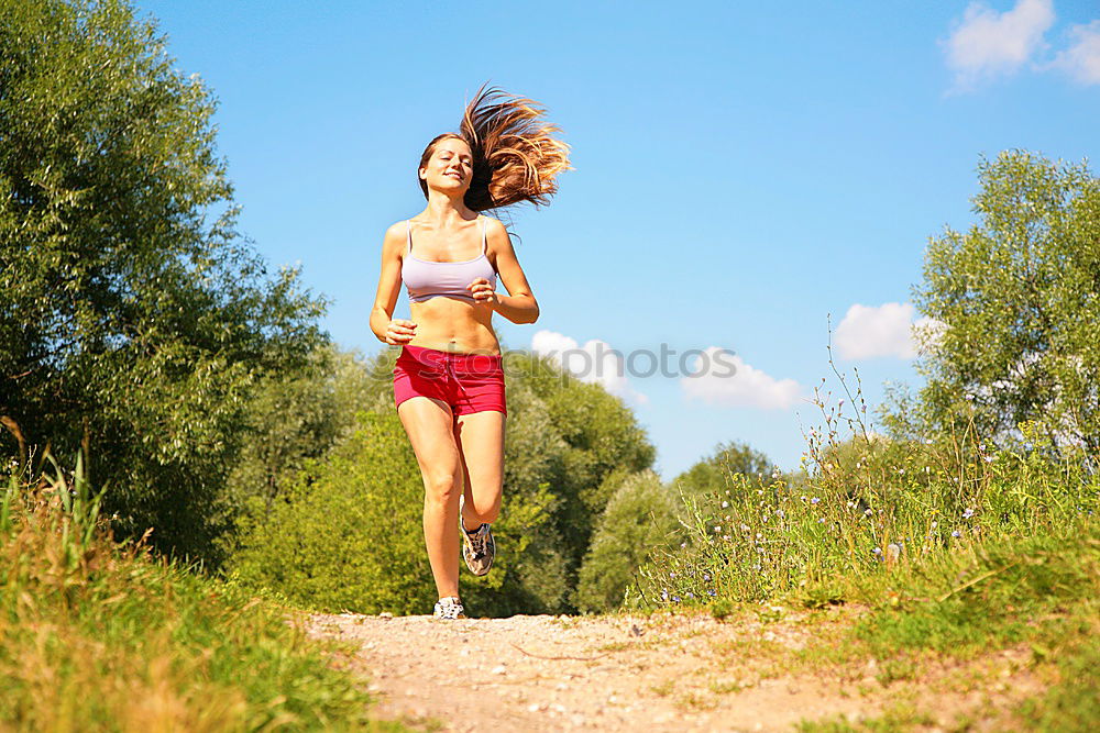 Similar – young woman jogging