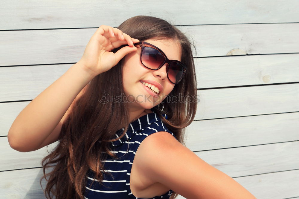 Similar – Beautiful woman with vintage old camera with soap bubbles taking photo