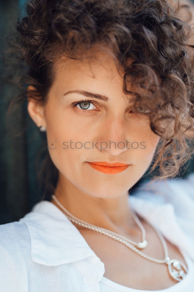 Similar – Portrait of a mature woman sitting on the chair posing thoughtful