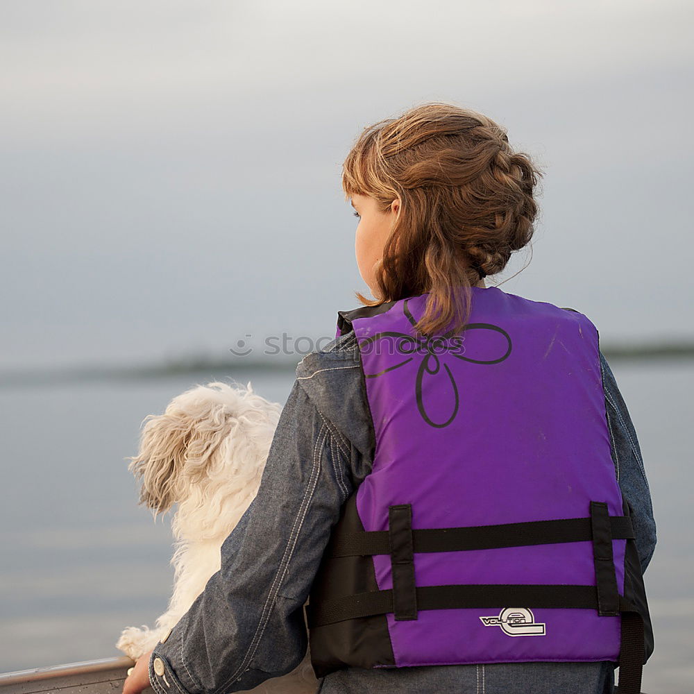 Similar – Image, Stock Photo Young woman with small dog at the lake