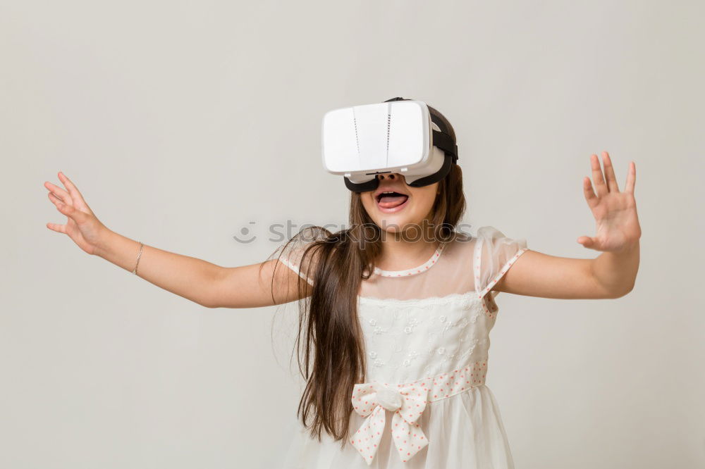 Similar – Image, Stock Photo young black woman wears virtual reality VR headset