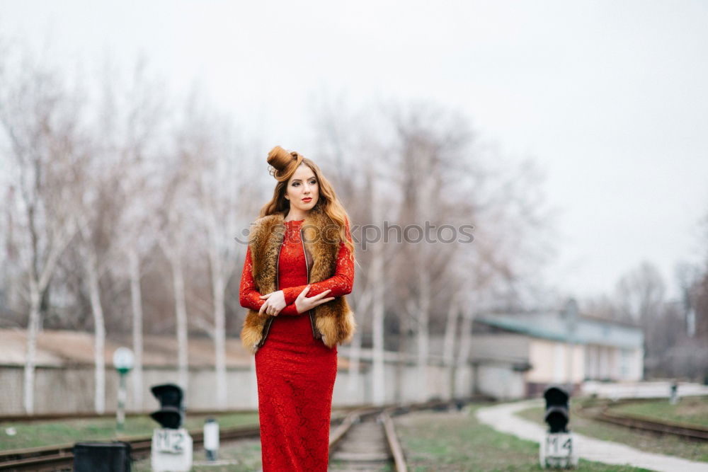 Similar – Image, Stock Photo Woman standing on the street with blur background