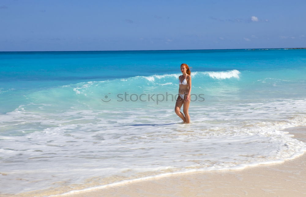 Similar – Woman in lagoon on tropical island