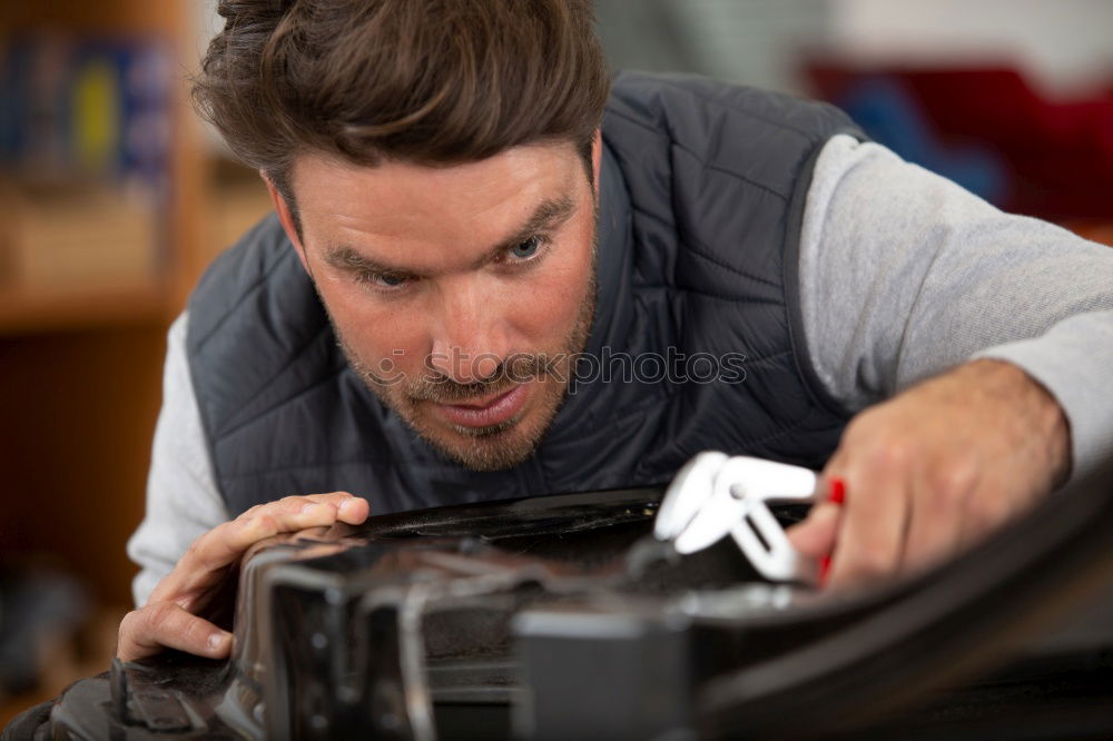 Similar – Person doing maintenance of bike