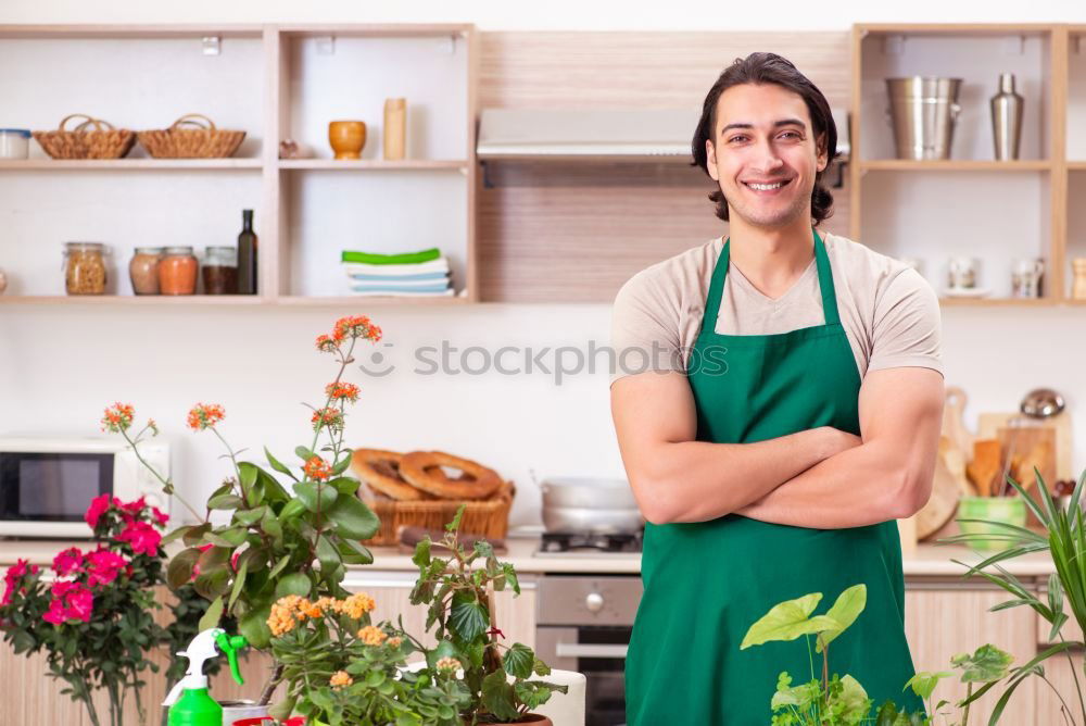 Similar – Image, Stock Photo Woman in work wear in her workshop by table with handmade items