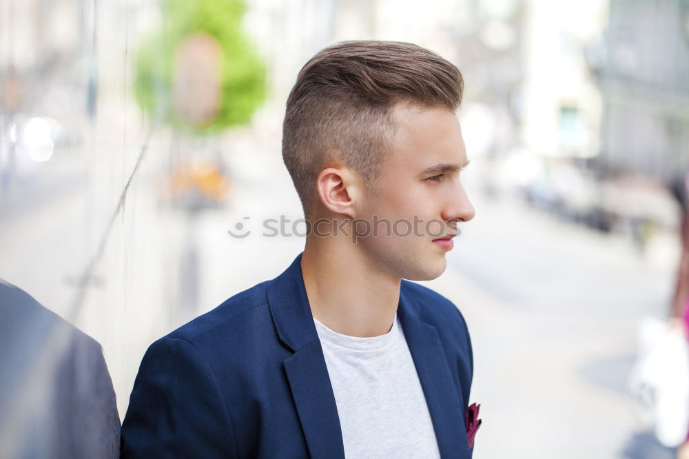 Similar – Image, Stock Photo Front view of trendy young man wearing coat and scarf