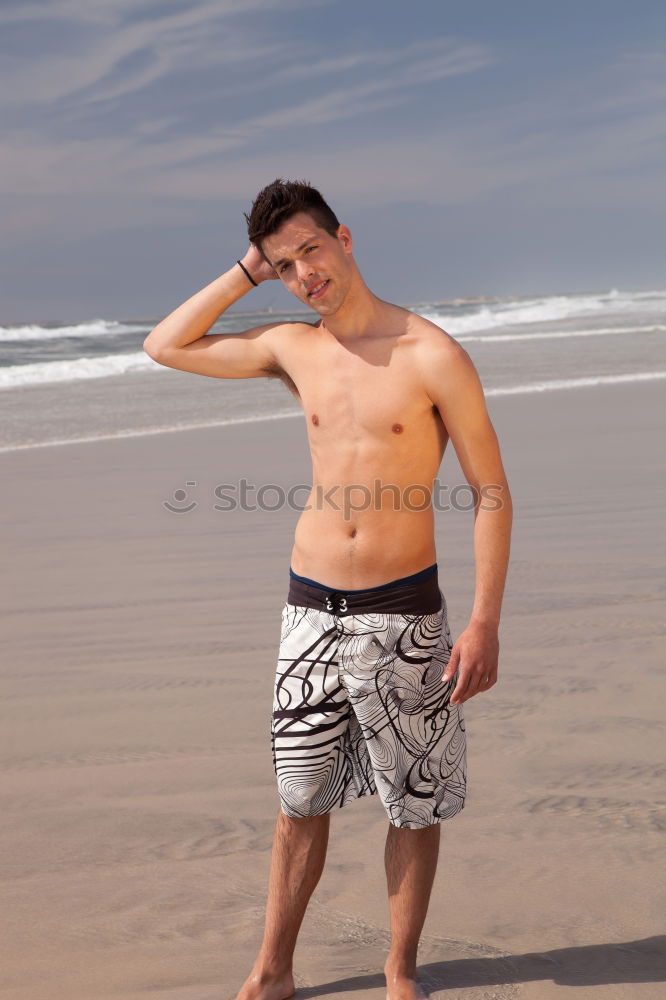 Similar – Young sports man is doing yoga for preparation of his workout