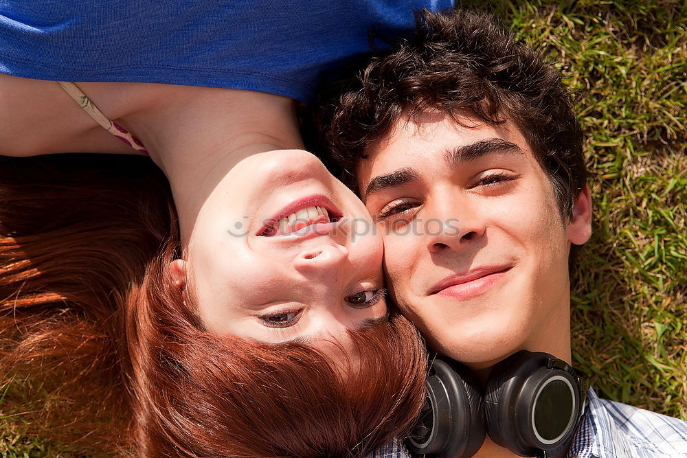 Similar – Image, Stock Photo a couple of teenagers lying in the grass