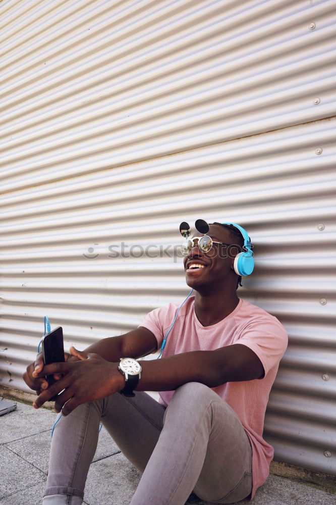 Black man posing on sports ground