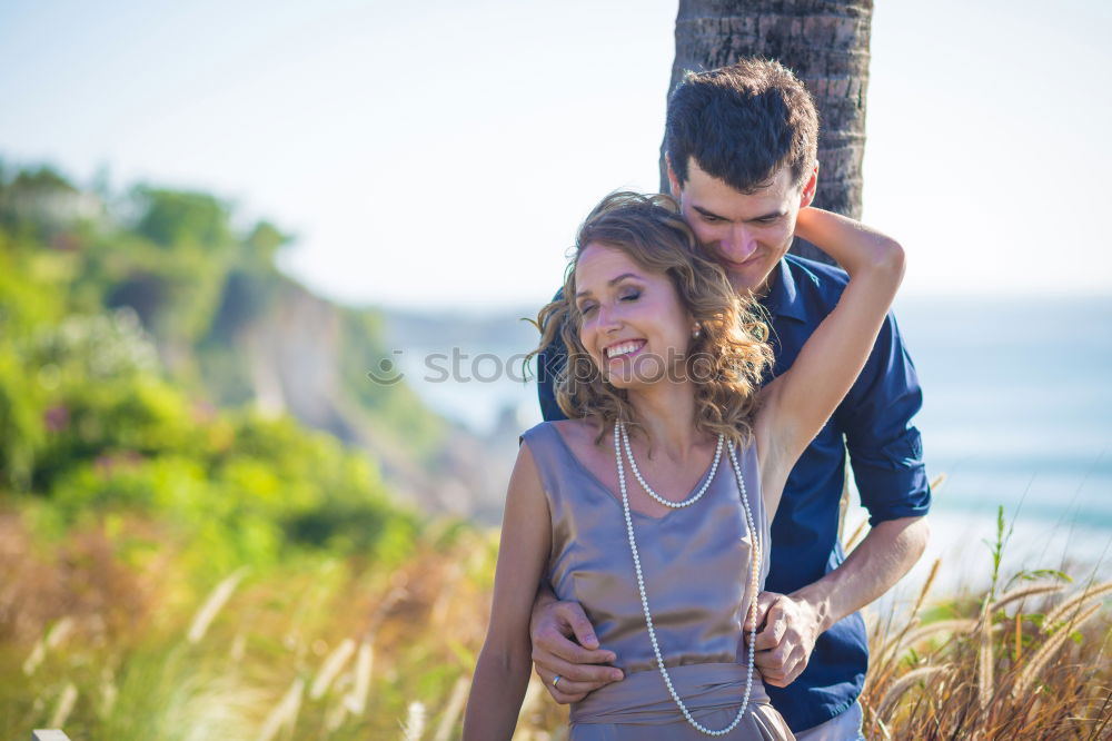 Similar – Young couple taking selfie photo with smartphone outdoors