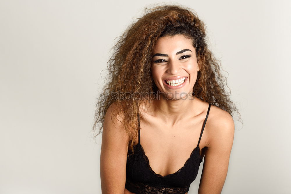 Similar – Young African woman with black curly hairstyle