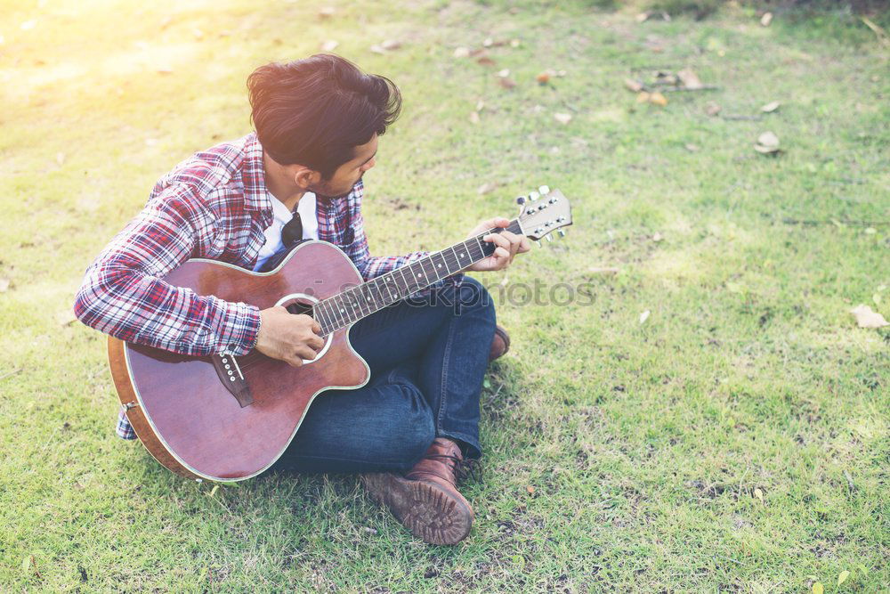 Similar – Image, Stock Photo Man playing guitar in nature