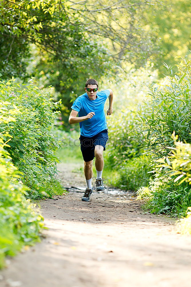 Similar – Senior Man Running in the Forest