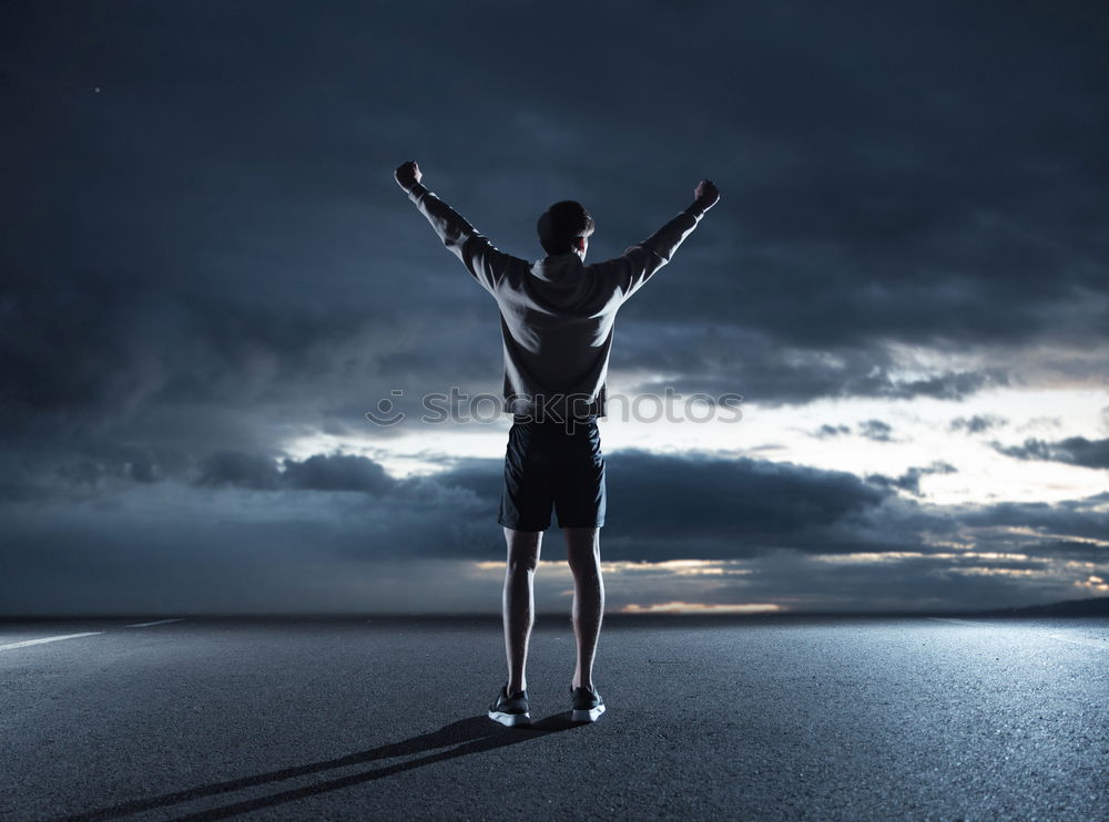 Similar – Image, Stock Photo Young man reflected on the beach in the waves